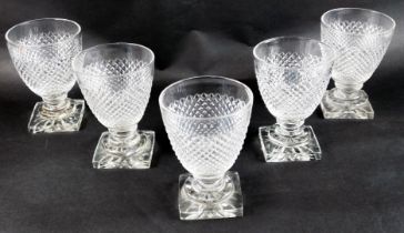 A set of five 19thC hobnail cut glass rummers, each on a square foot, 13cm high. (AF)
