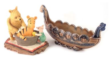 A Board of Fine Arts classic Pooh figure group, Tigger and bath tub, and a Wade Viking boat boxed. (