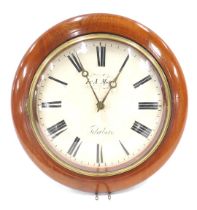 A late 19thC mahogany circular cased wall clock, the dial bearing name I&A Mark of Peterborough and