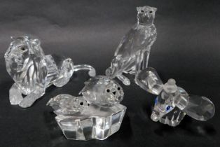 A group of Swarovski crystal animal figures, comprising Disney's Dumbo, seated ,leopard, lion, and t