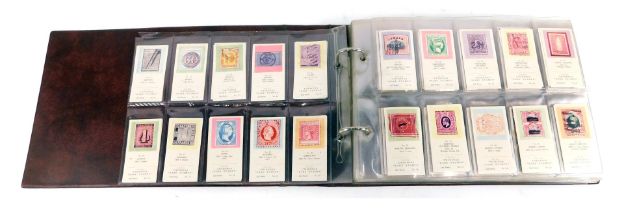 An album of cigarette and tea cards, to include the Twinings Rare Stamp Collection, Flags of the Wor