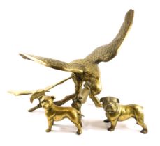 Four brass animal groups, comprising two dogs, 14cm high, and perched eagles, the largest 48cm high,