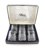 A set of six cut glass tumblers, in Waterford fitted box.