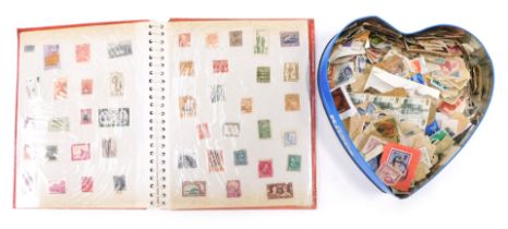A red stamp album and contents of stamps, to include Monaco, The Netherlands, Romania, Czechoslovaki
