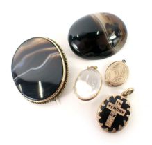 Agate set brooches, a Victorian enamel 'in memory' locket, a plated locket, and a rock crystal penda
