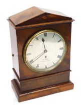A 19thC library timepiece by Dutton of Fleet Street, the mahogany case with an arched top above a br