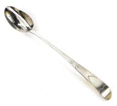 A George III Irish gravy sifting or straining spoon, old English pattern, with bright cut decoration