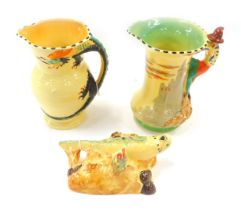 Two Burleighware jugs, comprising one decorated with a dragon handle and the other with the pied pip