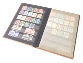 A Queen Elizabeth II stamp album, comprising pre-decimal and decimal stamps from 1930s-1970s, to inc