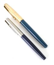 A Parker fountain pen, in turquoise casing with gold nib, and a Parker fountain pen with dark blue b