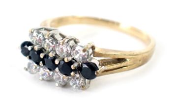 A 9ct gold dress ring, set with imitation diamonds and imitation sapphires, of three row design, rin