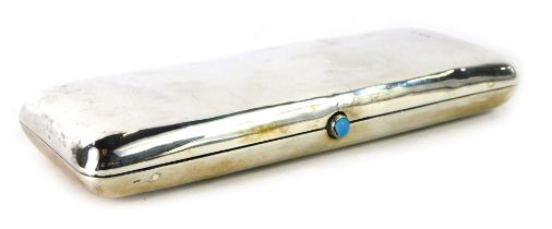 A Continental white metal cigar case, with turquoise set opening button, white metal stamped NI, 6.2