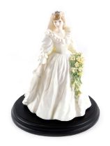 A Coalport Diana Princess of Wales figure, 29th July 1981, limited edition number 5450/12500, 23cm h