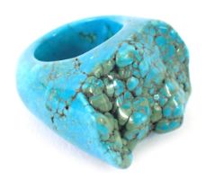 A chunky turquoise dress ring, of shaped design, ring size O, boxed.