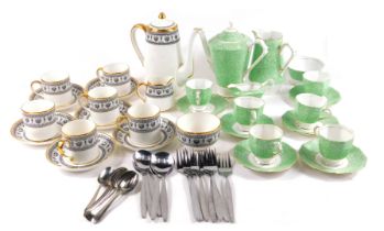 A Crown Staffordshire black Victoria pattern coffee service, comprising coffee pot, six coffee cans