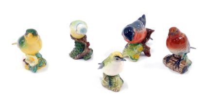 Five Beswick bird ornaments, comprising bullfinch, gold crest, green finch, blue tit, and a robin. (