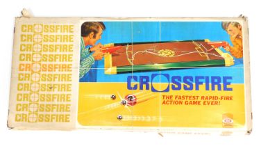 A Cross Fire rapid fire action game, boxed.