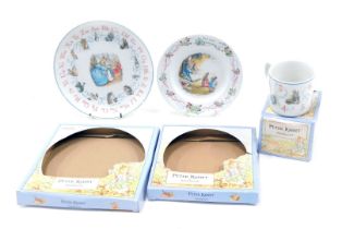 Wedgwood Peter Rabbit, comprising Christening mug, Christening plate, and ABC plate, boxed. (3)