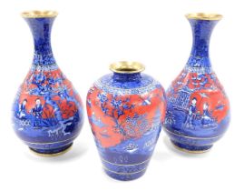 A pair of Foley ware Oriental style vases, each on a blue and red ground, 30cm high, and a similar v