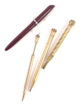 Four pens and pen cases, comprising a Watermans sky writer fountain pen in red case, a gilt twist pe