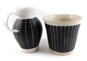 A Denby stoneware jug and planter, with blackened body with dot detail, 24cm and 19cm high. (2)