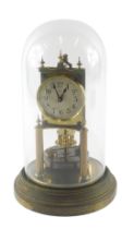 A Gustav Becker German brass anniversary clock, with glass dome, 30cm high overall.