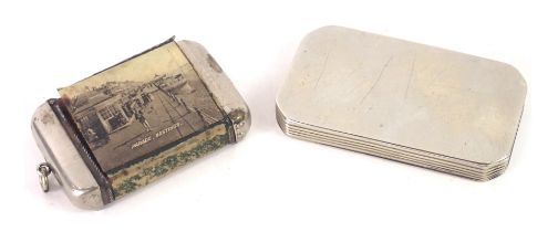 Two match cases, comprising a continental silver coloured metal snuff box part, with a ribbed border