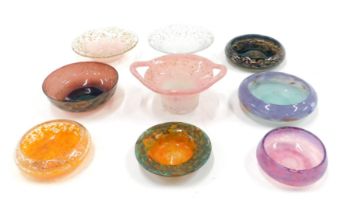 A collection of Art Glass, comprising mainly small pin dishes and bowls, each on pink and purple gro