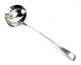 A Victorian silver fiddle pattern serving ladle, bearing ram crest, maker WS, London 1871, 5.5oz.