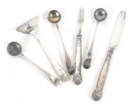 A group of silver and white metal cutlery, comprising a silver fiddle pattern tea spoon, three silve