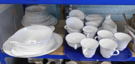 A Royal Doulton carnation pattern part tea and dinner service, comprising tureen, oval serving plate