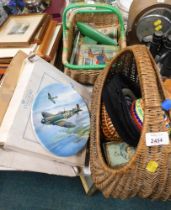 Two wicker carry baskets, a Chad Valley tin plate toy, conductors cap, model yacht, jigsaw, cabinet