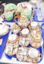 Oriental part tea wares, comprising a green and dragon finish part service, and an Imari style eggsh