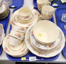 A J Friar and Sons floral part tea service, to include milk jug, teacup, saucers, bowls, etc., and s