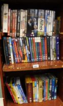 Various DVDs, to include Narnia, Planets, Space, The Ashes, and others. (2 shelves)