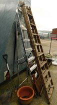 Two wooden step ladders, a fold away table, terracotta planter, and a fork. (a quantity)