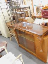 A teak bookcase, two pine beech effect kitchen stools, cabriole legged coffee table, reproduction co