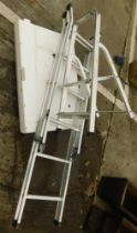 A white plastic garden table, step ladder, and a two step ladders. (3)
