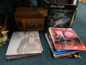 A teak cased recorder player and quantity of records, to include Non Stop Dancing, James Last, Jim R