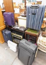 A mahogany fire surround with electric fire, five suitcases, travel Duronic two ring stove, heater,