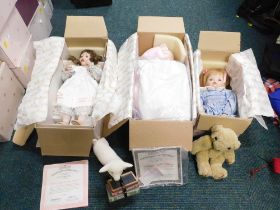 Three Ashton Drake gallery dolls, comprising Hannah Needs A Hug, Newborn Baby, and Mary Had A Little
