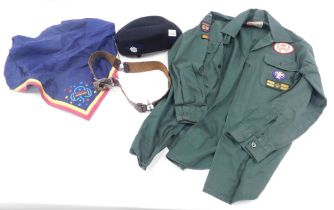 Girl guiding items, comprising a girl guiding belt, hat, necker, together with a Scout's green shirt