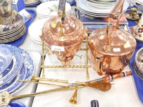 Copper and brass wares, comprising a Victorian copper kettle, and a copper kettle on stand and spiri