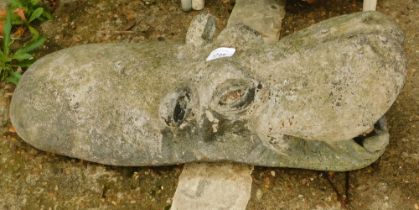 A reconstituted stone garden ornament of a hippopotamus.