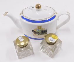 A Ringtons Tea Centenary teapot, two cut glass and brass topped inkwells.