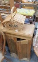 A pine two door cabinet, Fortnum and Mason basket, mahogany stool, and a high seated chair.