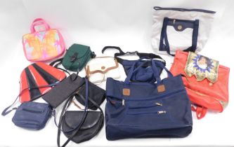 Twelve assorted ladies bags and purses.