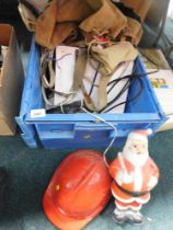 A plastic Santa figure, rag doll, lady's bags, overcoat, etc. (1 box)