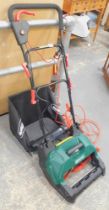 A Qualcast electric mower and grass box.