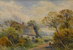 Frank Gresley (1855-1936). Figure outside Thatch Cottage, watercolour, signed, 18cm x 27cm.